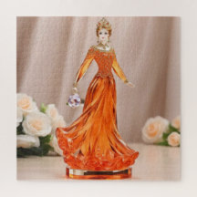 Kristallglasprinzessin mit orangefarbenem Kleid
