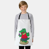 Krokodil mit Blume Schürze (Getragen)