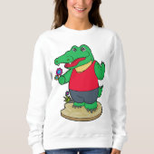 Krokodil mit Blume Sweatshirt (Vorderseite)