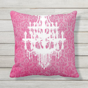 Kronleuchter-Silhouette und rosa Damaskus Kissen