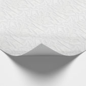 Krumpelkrumpel aus weißem Papier mit geschliffener Geschenkpapier (Ecke)