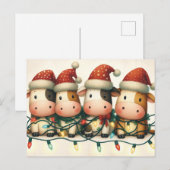 Kühe mit Weihnachtslicht der Weihnachtsmannmütze Feiertagspostkarte (Vorne/Hinten)