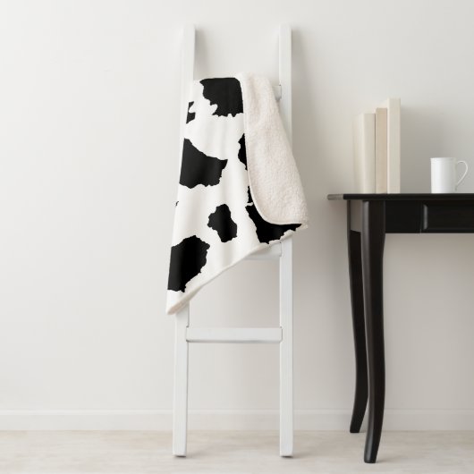 Kuhhaut Schwarz-Weiß-Muster Sherpadecke (Beispiel)