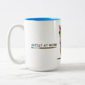 Künstler bei der Arbeitsgruppe Pinselpinsel mit Fa Zweifarbige Tasse (Links)