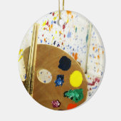 Künstler malen Spritzer und Farbpalette Keramikornament (Links)