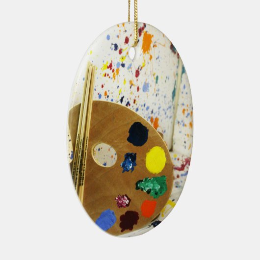 Künstler malen Spritzer und Farbpalette Keramikornament (Rechts)