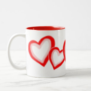 Künstlerisch rotes rosa Herzmuster auf Weiß Zweifarbige Tasse