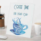 Künstlerischer Blue Coffee Cup mit wirbelnden Must Sockelschild (In Situ)