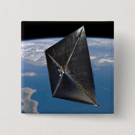 Künstlerisches Konzept von NanoSail-D im Weltraum Button (Vorderseite)
