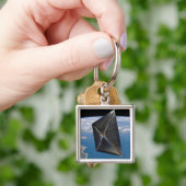 Künstlerisches Konzept von NanoSail-D im Weltraum Schlüsselanhänger (Hand)