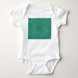 Künstliche geflochtene grüne Stofftextur. Baby Strampler