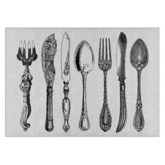 Kunstmesser und Gabel der Vintagen Küchenzeile Schneidebrett