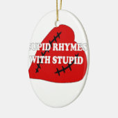 Kupiden Rymnen mit Dummkopf Keramik Ornament (Links)