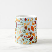 Kürbisfarbenfrohe rot-orangefarbene gelbe fallende kaffeetasse (Mittel)