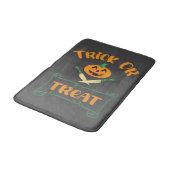 Kürbisgesicht Halloween oder Kreuzknochen probiere Badematte (Schrägansicht)