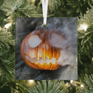 Kürbiskopf brennt an Halloween Ornament Aus Glas