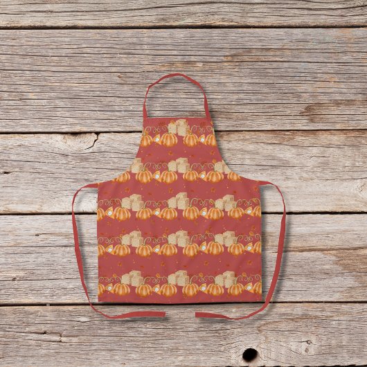 Kürbiskuchen und braune Zuckerwürfel rot Schürze