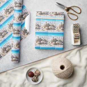 Kürbisse und Seesterne am Strand Geschenkpapier