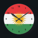 Kurdistan Runde Wanduhr<br><div class="desc">Flagge von Kurdistan. Die Flagge vom Kurdistan (kurdisch: Alay Kurdistan auch genanntes Alaya Rengîn "die bunte Flagge") erschien zuerst während der kurdischen Unabhängigkeit der Republik von Mahabad. Es wird z.Z. während die offizielle Flagge der autonomen Kurdistan-Region im Irak verwendet, der unter Kontrolle der Kurdistan-regionalen Regierung ist. Die Flagge wird in...</div>