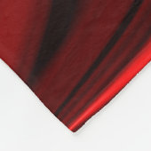 Kurven in metallischem Rot und tiefroten Teilen Fleecedecke (Ecke)