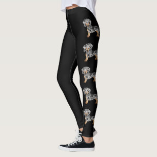 Kurze Dackel-Hunde mit Schwarz-Tan-Daple Leggings