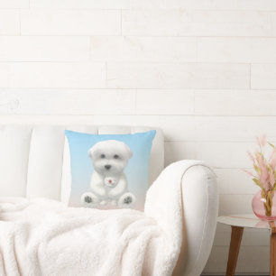Kuscheliger Moment: Lächelnder Bichon umarmt Mini- Kissen