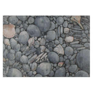 Küstenstrand Kiesel und Muscheln Druck Schneidebrett