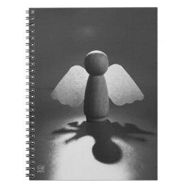 Kwetsbaarheid en breekbaarheid symbolic in Engel. Notizblock