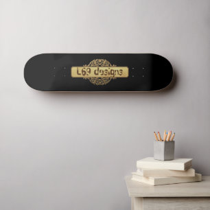 L69 DESIGNS GOLD BANNER SKATEBOARD