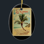La Romana Palm Tree Vintage Keramik Ornament<br><div class="desc">Ein einzigartiges Retro Mitte des Jahrhunderts moderne La Romana Dominikanische Republik Kunstdruck in Vintage Reise Poster Stil. Es verfügt über eine geschwungene Palme am Sandstrand mit Ozean unter einem blauen bewölkten Himmel.</div>