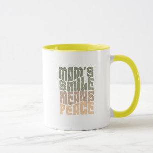 Lächeln der Mutter bedeutet Frieden – Grüner & Mar Tasse