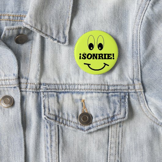 Lächeln, Sonrie! Button (Beispiel)