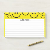 Lächelnde Gesichter in sonnengelber Vorlage nach d Post-it Klebezettel (Auf Schreibtisch)