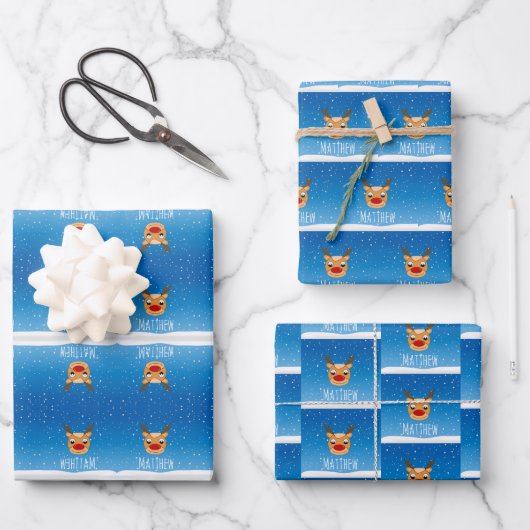 Lächelnder Rentierschneefall personalisiert blau Geschenkpapier Set (Vorderseite)