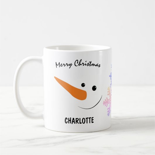 Lächelnder Schneemann mit langer Nase, frohe Weihn Kaffeetasse (Links)