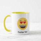 Lächelndes Gesicht mit herzförmiger Tasse (Links)