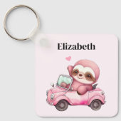 Lächelndes rosa Faultier, das ein Cabrio antreibt Schlüsselanhänger (Vorderseite)
