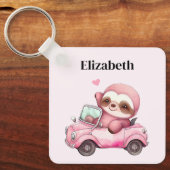 Lächelndes rosa Faultier, das ein Cabrio antreibt Schlüsselanhänger (Vorderseite)