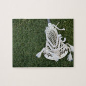 Lacrosse-Stick auf Gras Puzzle (Horizontal)