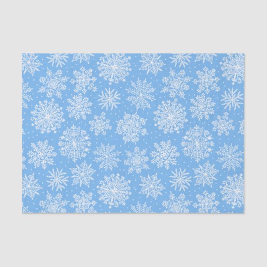 Lacy White Snowflakes auf einem hellblauen Hinterg Seidenpapier (Vorderseite)