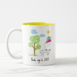 Laden Sie die Zeichnung Ihres Kindes hoch und verw Zweifarbige Tasse