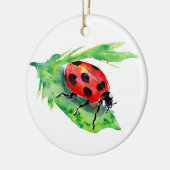 Ladybug auf einem grünen Blatt Keramik Ornament (Links)