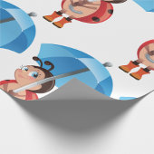 Ladybug unter einem Umbrettpapier Geschenkpapier
