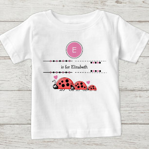 Ladybugs fügen den Namen schwarz und rosa hinzu Baby T-shirt