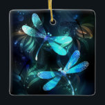 Lake Glows Dragonflies Keramikornament<br><div class="desc">Zwei lichtdurchflutete,  türkisfarbene,  kunstvoll gezeichnet Libellen mit lichtdurchlässigem Sealgen und Glühwürmchen im Hintergrund. Glühende Libelle.</div>