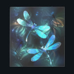 Lake Glows Dragonflies Notizblock<br><div class="desc">Zwei lichtdurchflutete,  türkisfarbene,  kunstvoll gezeichnet Libellen mit lichtdurchlässigem Sealgen und Glühwürmchen im Hintergrund. Glühende Libelle.</div>