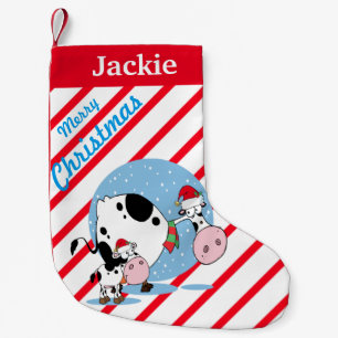 Land-Kühe mit Kleiner Weihnachtsstrumpf