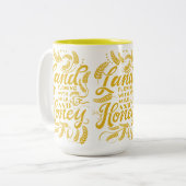 Land mit Tasse aus Milch und Honig (Vorderseite Links)