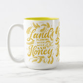 Land mit Tasse aus Milch und Honig (Links)