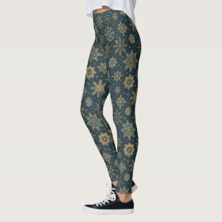 Ländliche goldene Schneeflocken auf dunklem Grün Leggings